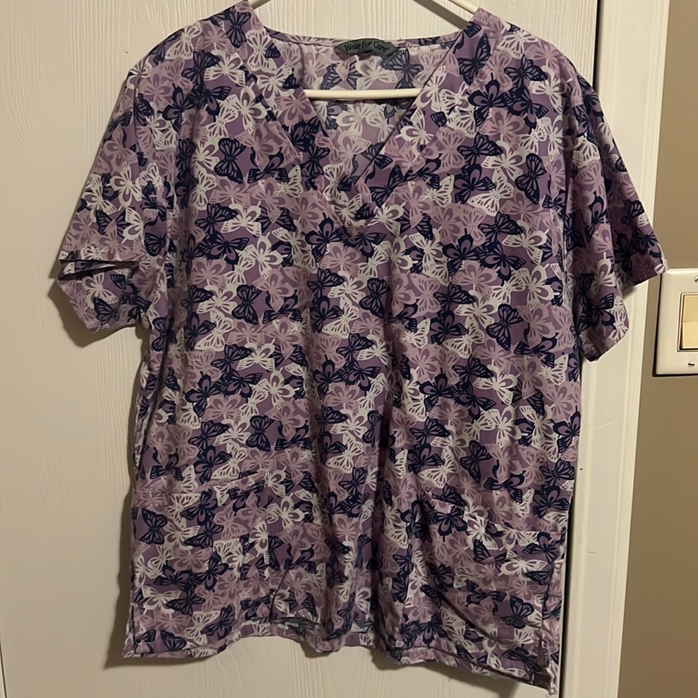No longer wear scrubs. XL